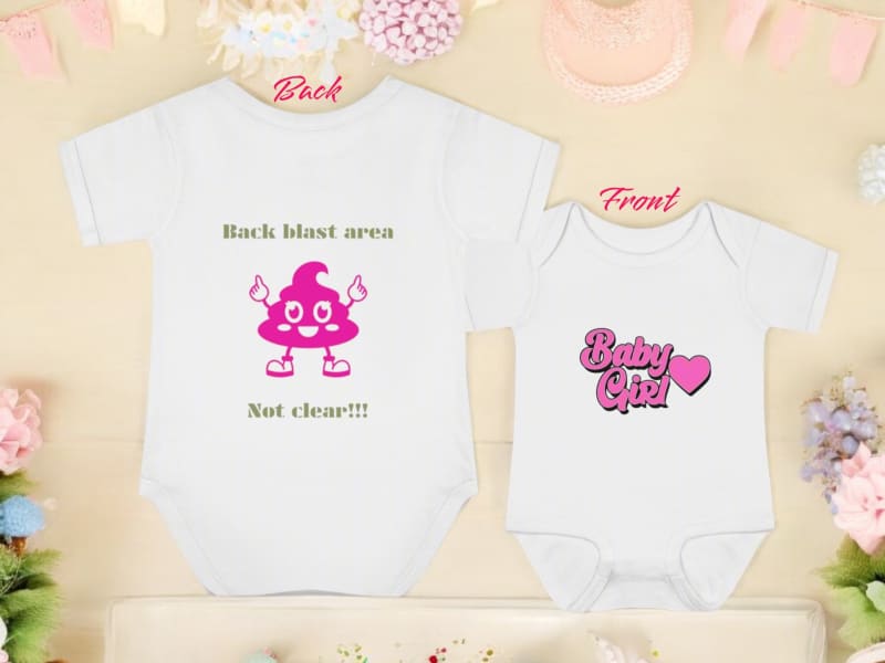 Two white baby onesies with humorous printed designs.