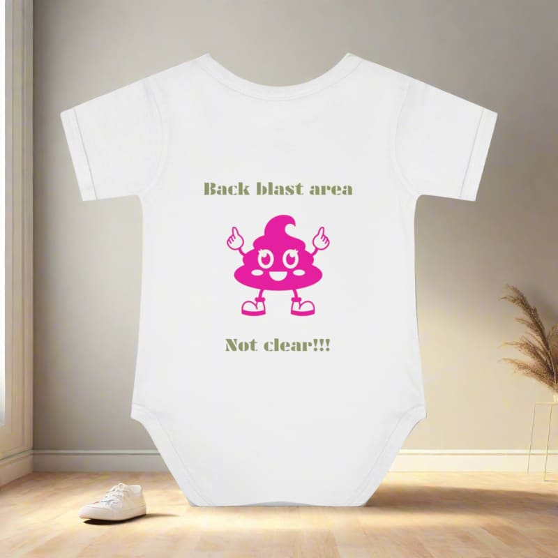 White baby onesie with a humorous poop-themed graphic and text.