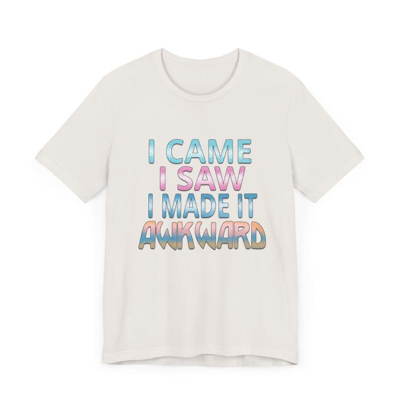 White t-shirt with blue and pink gradient text reading ’I CAME I SAW I MADE IT AWKWARD’