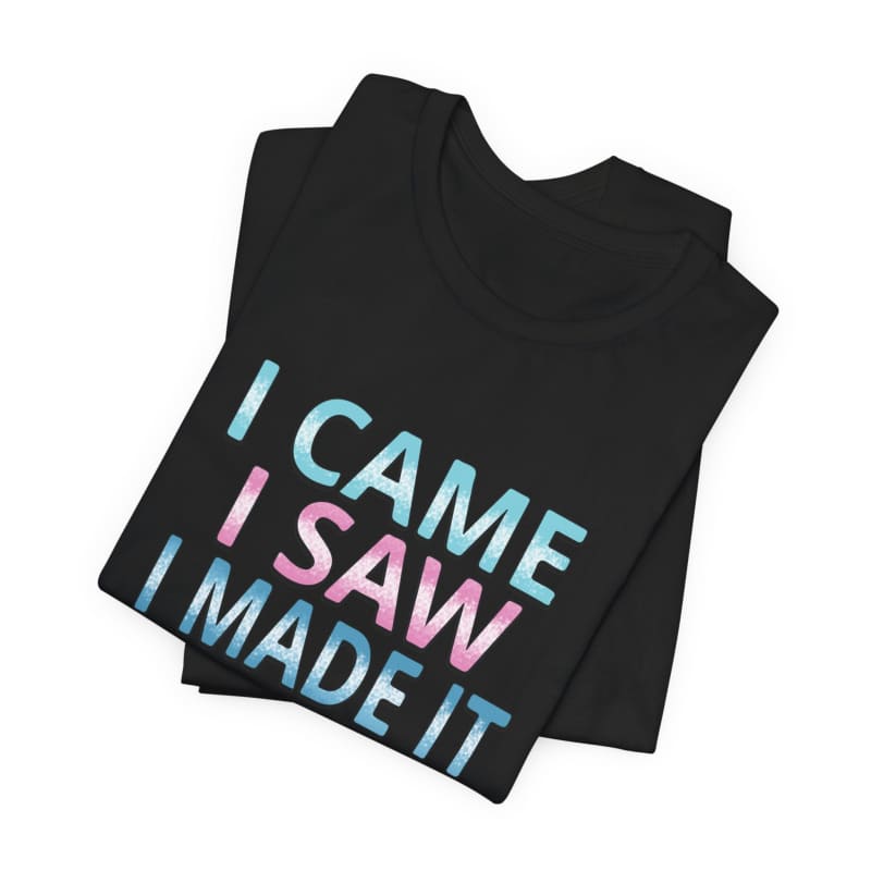 Black t-shirt with ’I CAME I SAW I MADE IT’ text in blue and pink lettering.