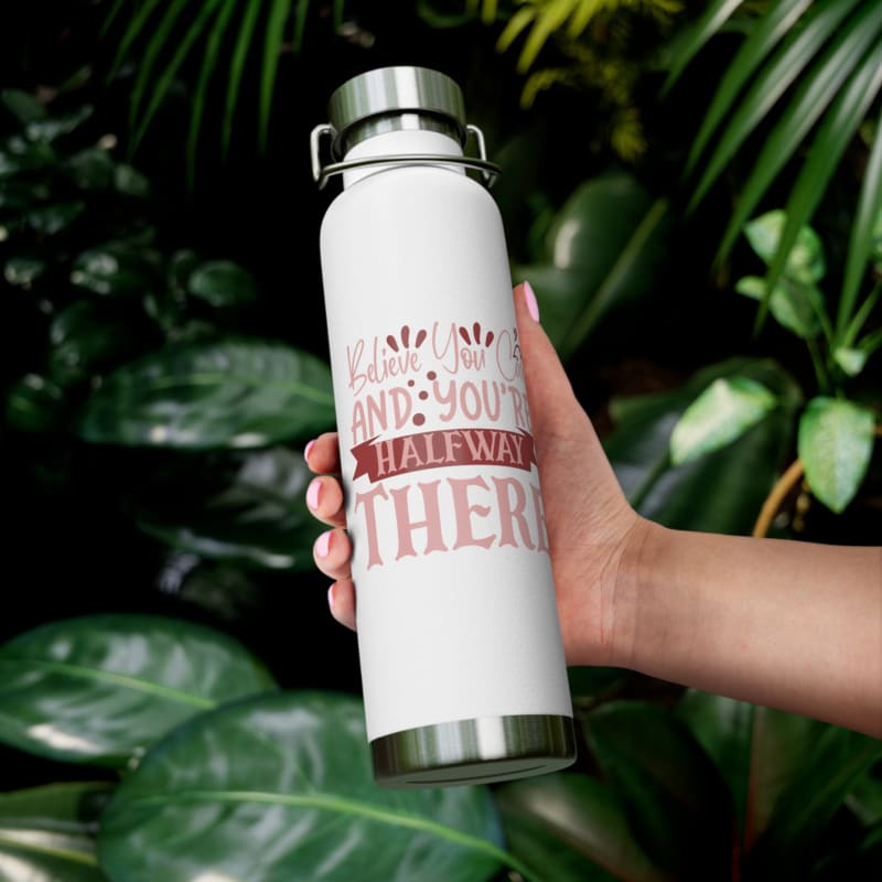 White reusable water bottle with motivational text in red lettering.