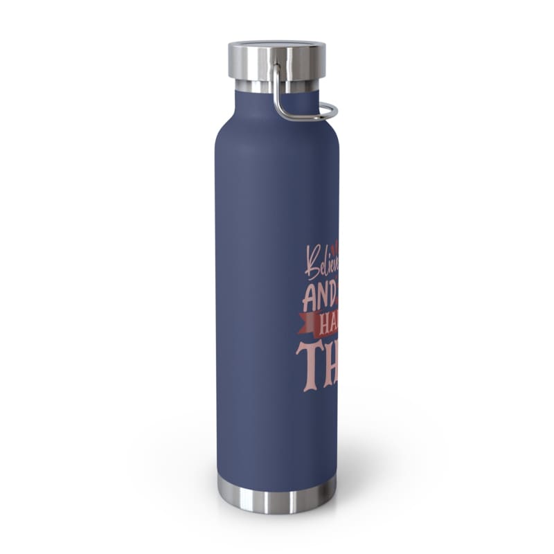 Navy blue insulated water bottle with a motivational phrase printed on it.