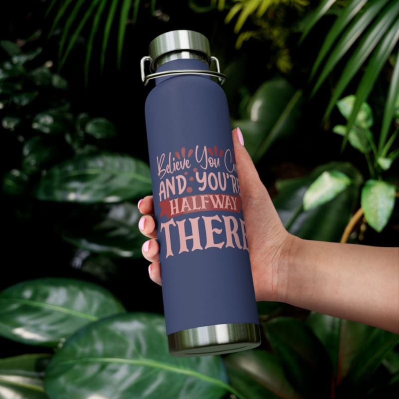 Navy blue insulated water bottle with motivational text in pink and white lettering.