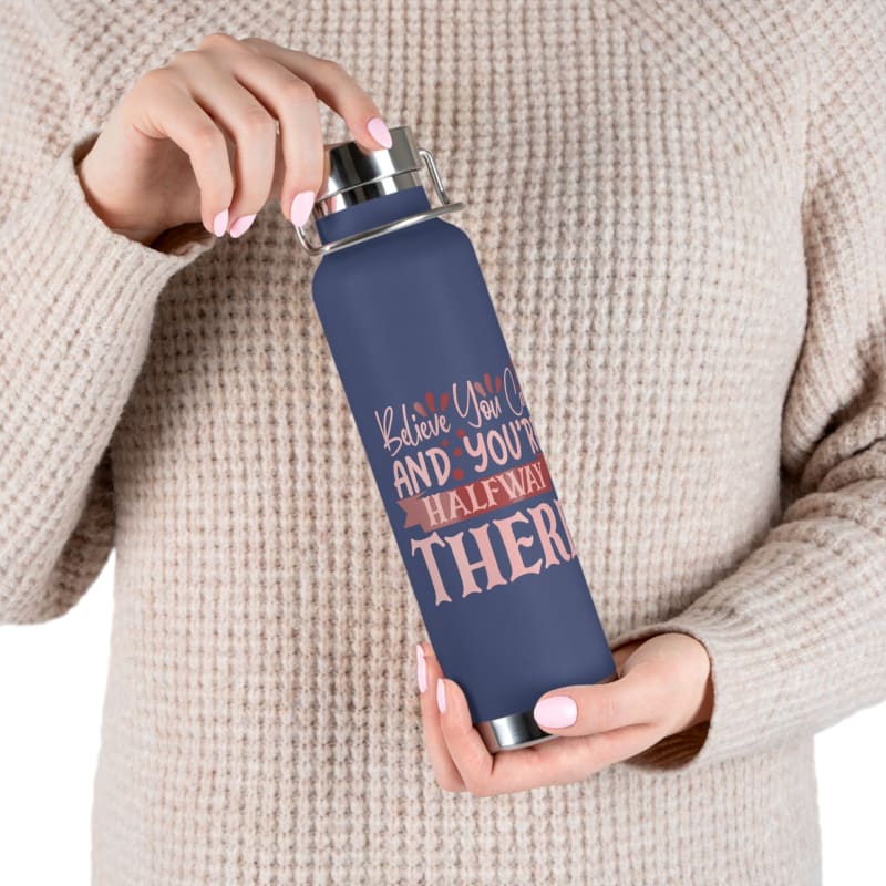 Navy blue reusable water bottle with motivational text.