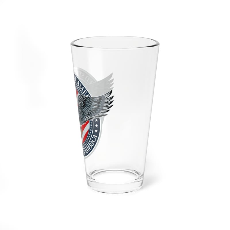 Clear glass pint with an eagle and American flag emblem printed on it.