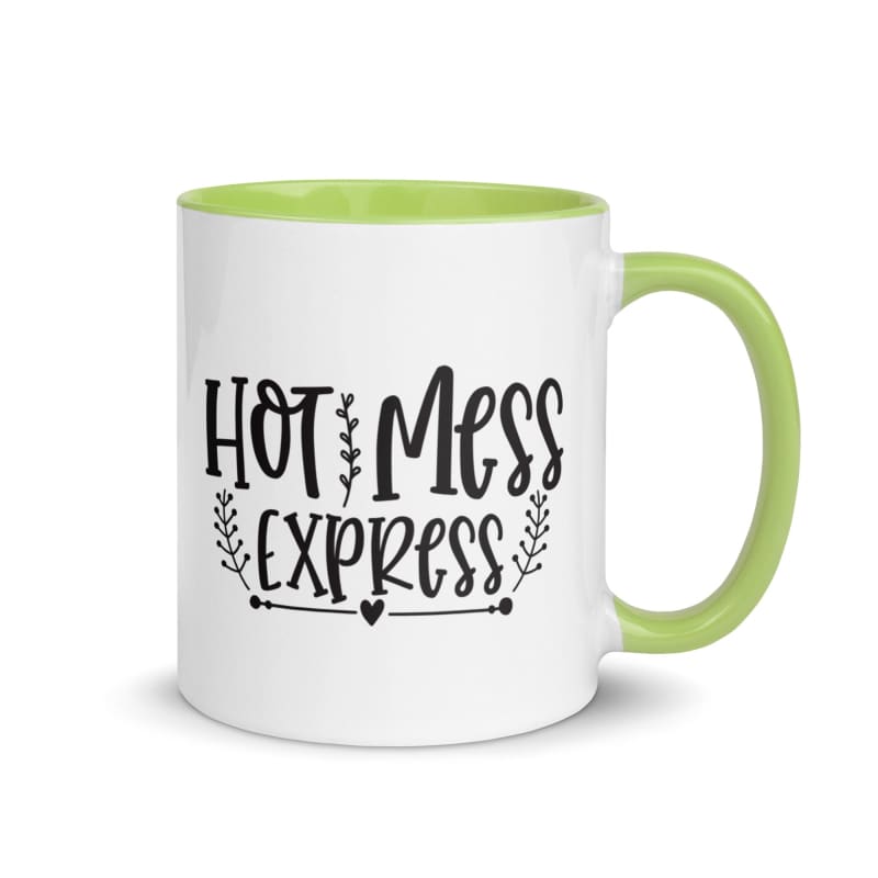 Coffee mug with ’Hot Mess Express’ text and green interior and handle.