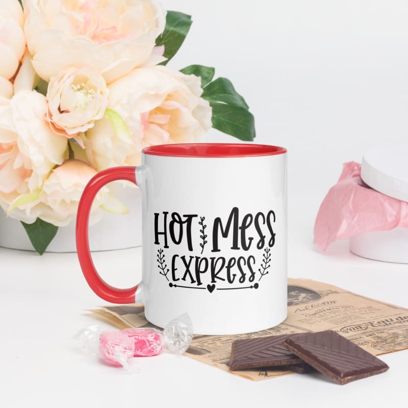 White ceramic mug with red interior and handle, featuring the text ’HOT MESS EXPRESS’ in black lettering.