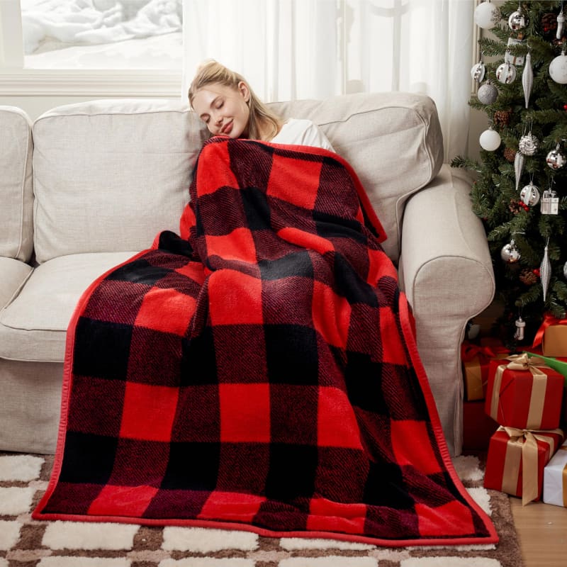 Red and black buffalo plaid fleece blanket.