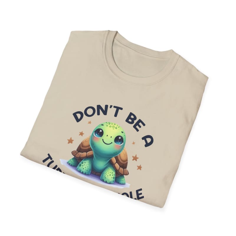 Beige t-shirt featuring a cute cartoon turtle design with text ’DON’T BE A’