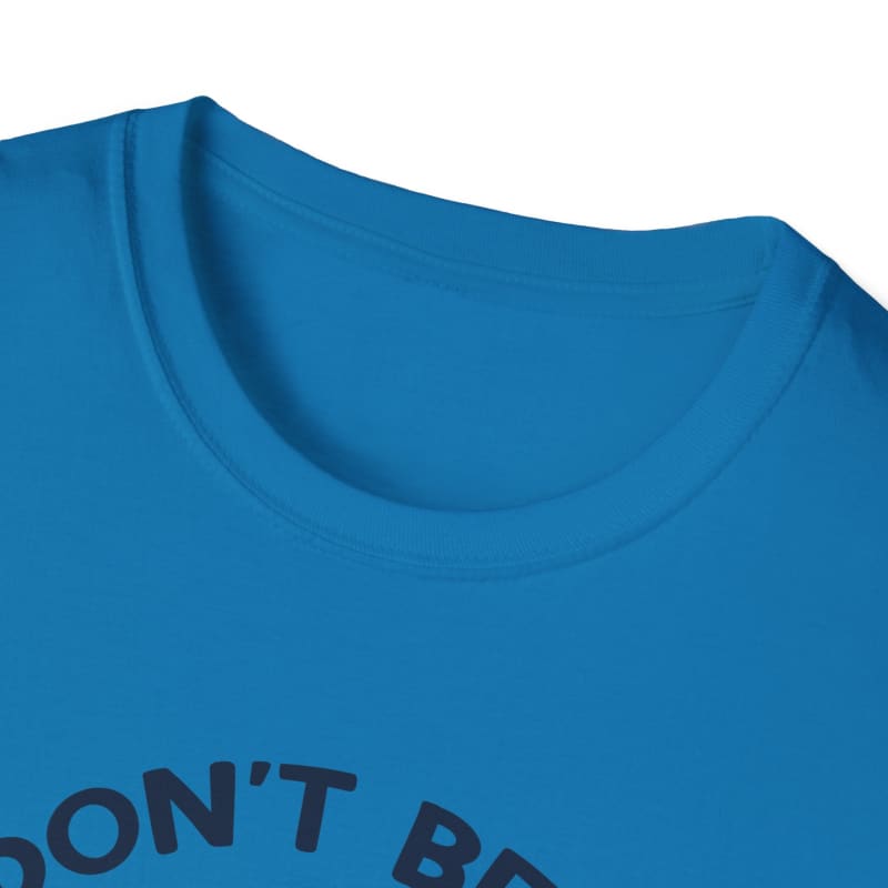 Blue t-shirt with partial text visible at the bottom.