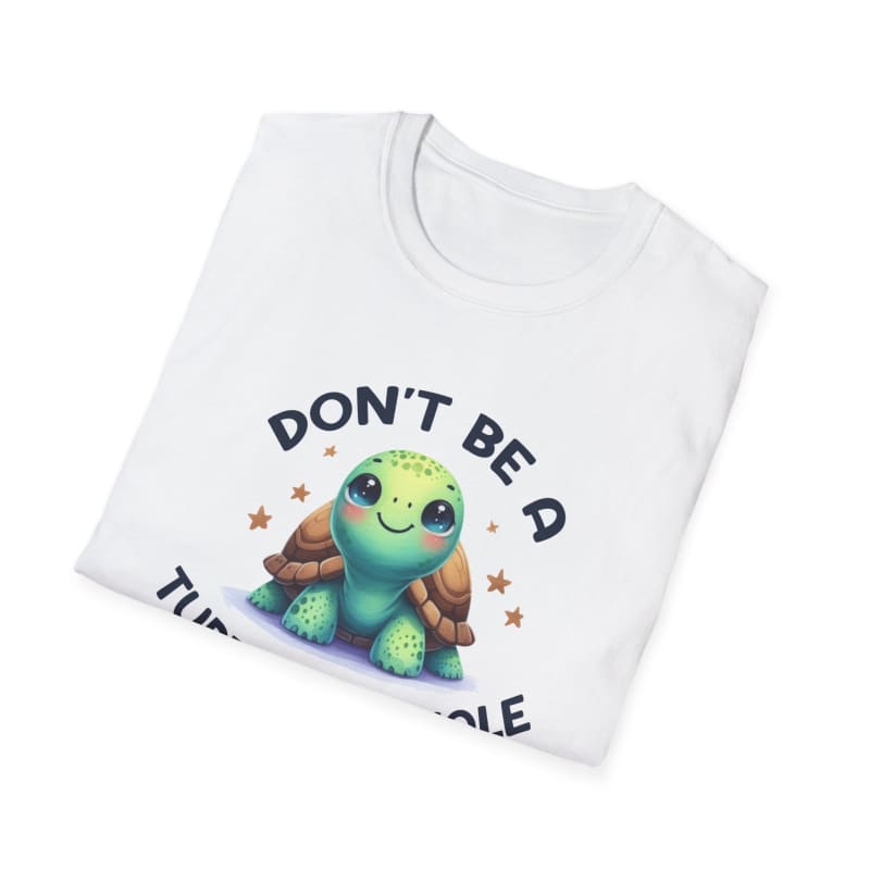 White t-shirt featuring a cute cartoon turtle design with stars and text.