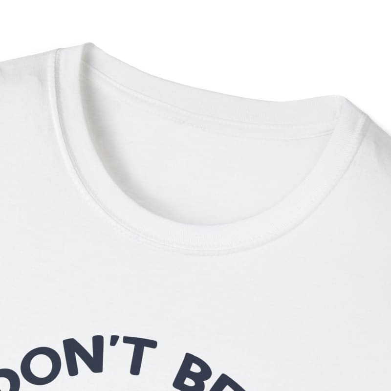 White t-shirt with partial black text visible.