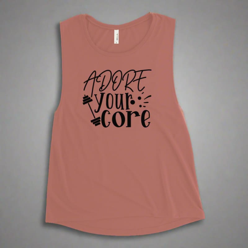 Sleeveless pink tank top with ’Adore your core’ text printed on it.