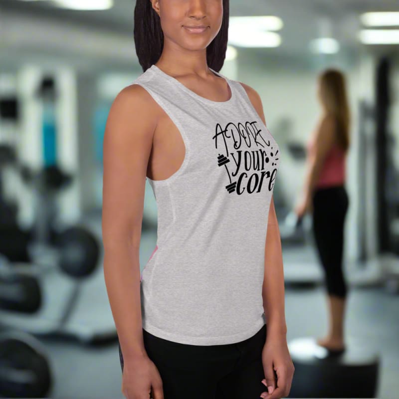 White sleeveless tank top with ’Adore Your Body’ text printed on the front.