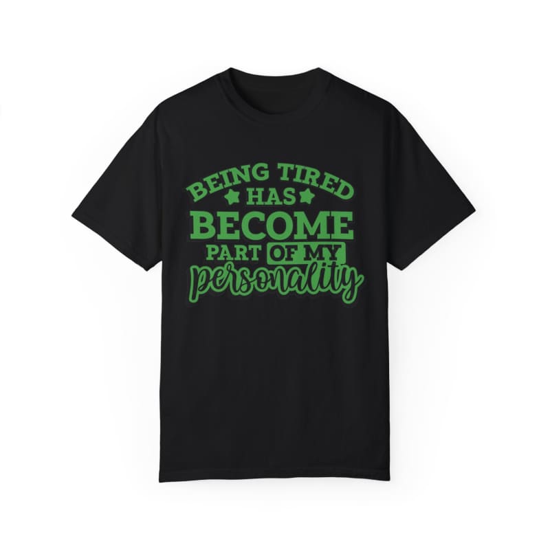 Black t-shirt with green text saying ’Being tired has become part of my personality’.