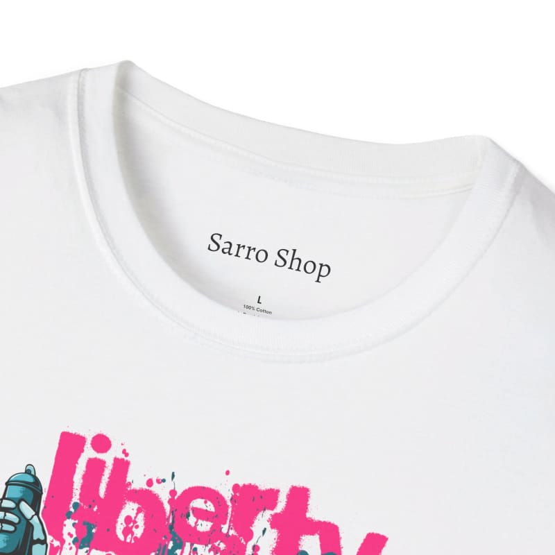 White t-shirt with ’Sarro Shop’ printed at the neckline and a partial pink graphic visible below.