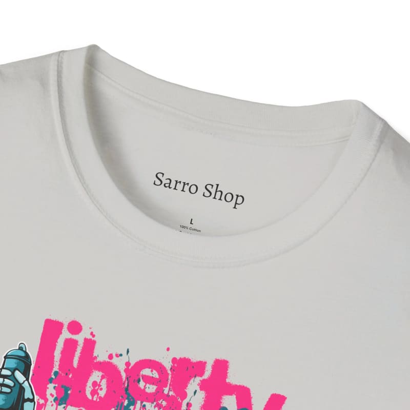 White t-shirt with ’Sarro Shop’ printed on the collar and a partial pink graphic visible below.