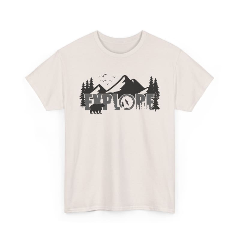 Cream-colored t-shirt featuring a black mountain landscape design with trees and ’EXPLORE’ text.