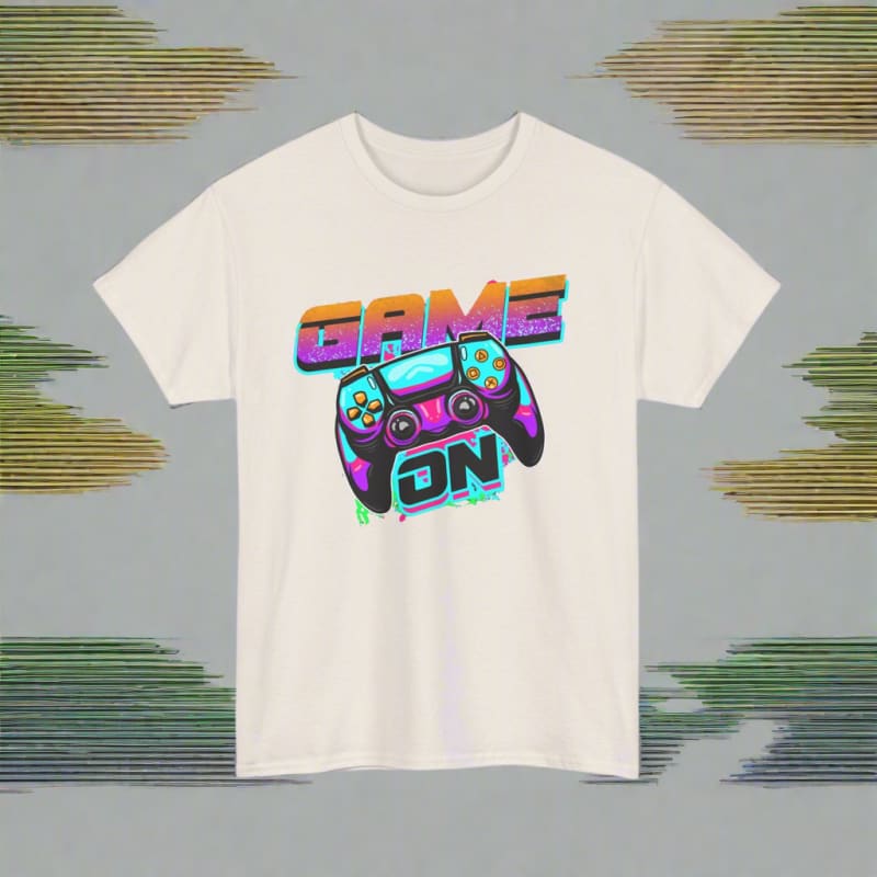 White t-shirt featuring a colorful ’GAME ON’ graphic with a video game controller design.