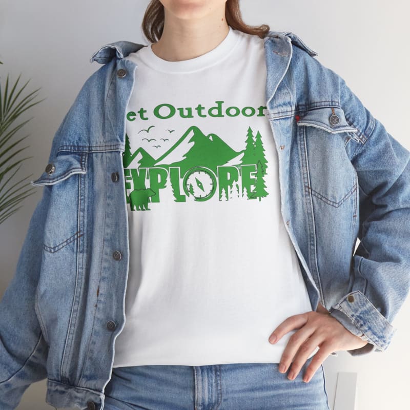 White t-shirt with green ’Get Outdoor Explore’ text and mountain graphic, worn under a light blue denim jacket.