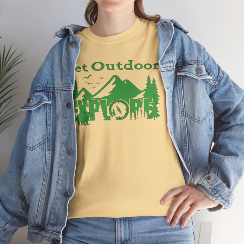 Yellow t-shirt with ’Get Outdoors Explore’ text and mountain graphics worn under a denim jacket.