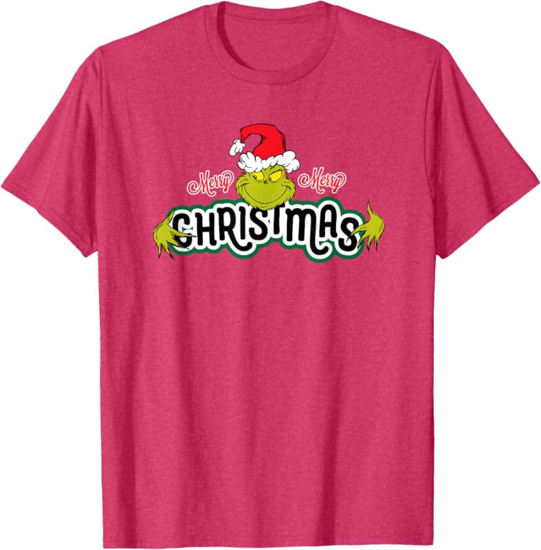 Pink t-shirt with a festive ’Christmas’ graphic featuring a Santa hat and green decorative elements.