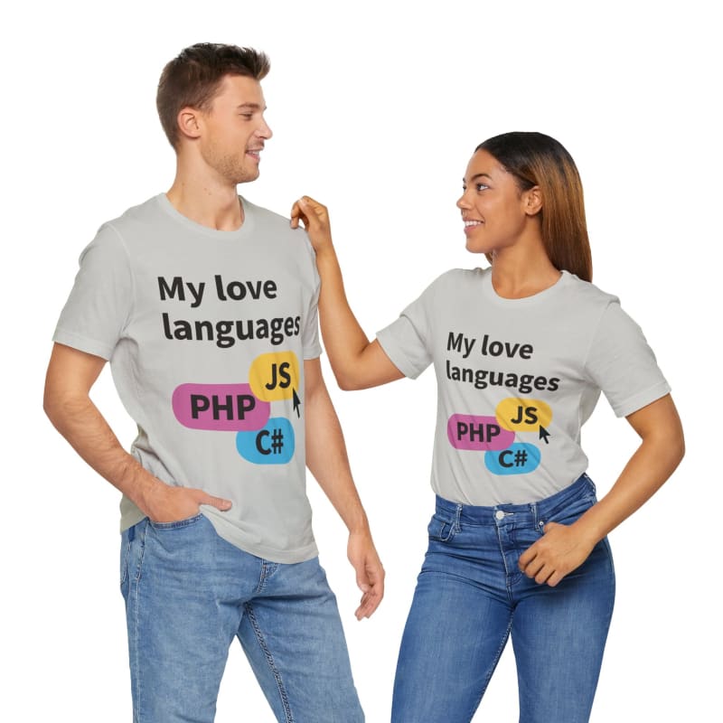 Matching t-shirts worn by a couple featuring programming languages as ’love languages’.