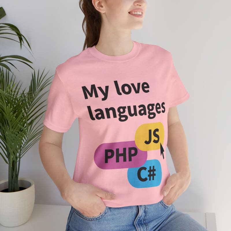 Pink t-shirt with ’My love languages’ text and programming language abbreviations PHP, JS, and C# printed on it.