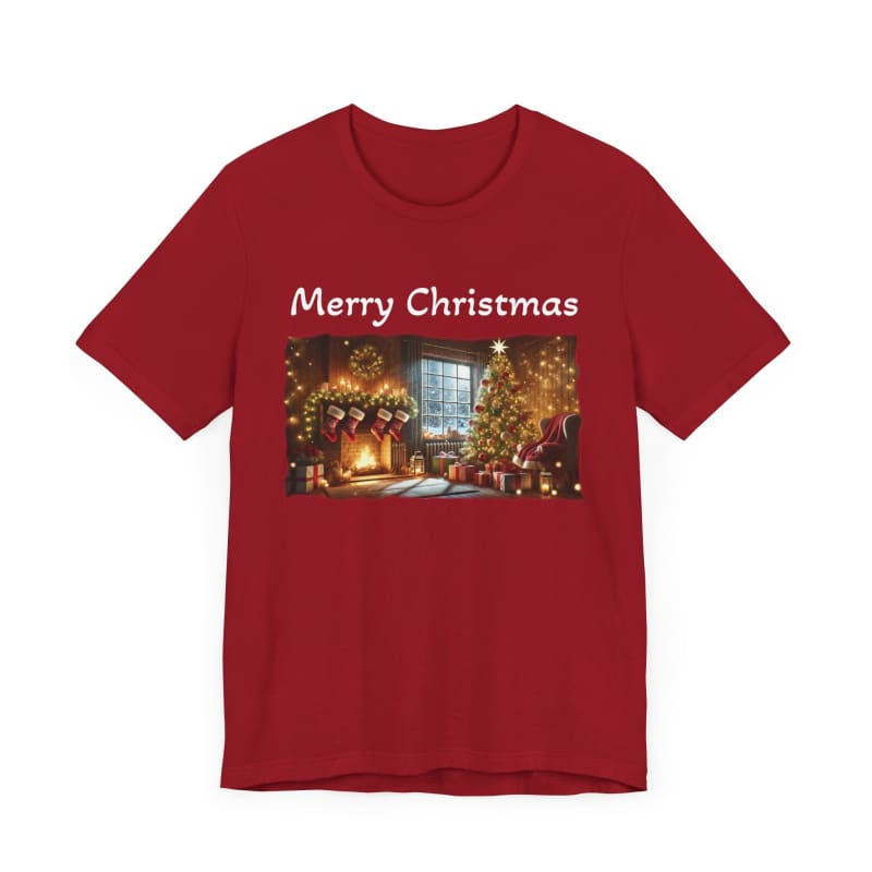 Red t-shirt with ’Merry Christmas’ text and a festive holiday scene printed on it.