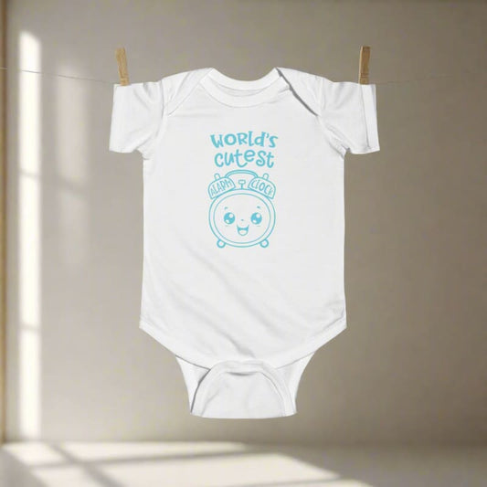 White baby onesie with blue text and a cute cartoon face design.