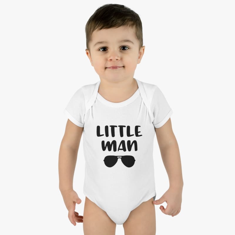 White baby onesie with ’LITTLE MAN’ text and sunglasses graphic.