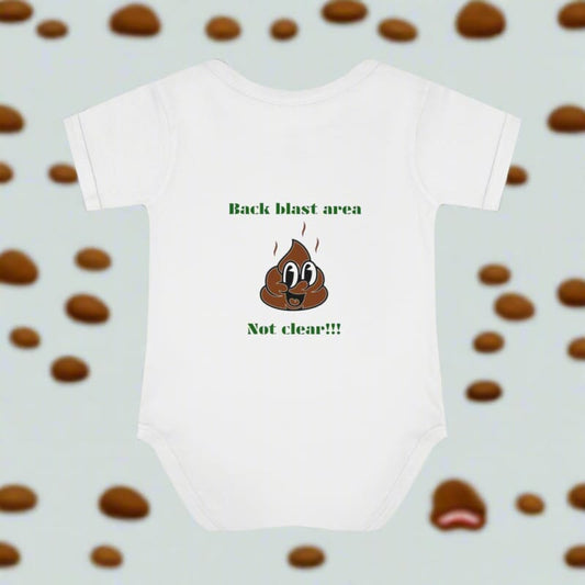 White baby onesie with a cartoon poop emoji and humorous text printed on it.