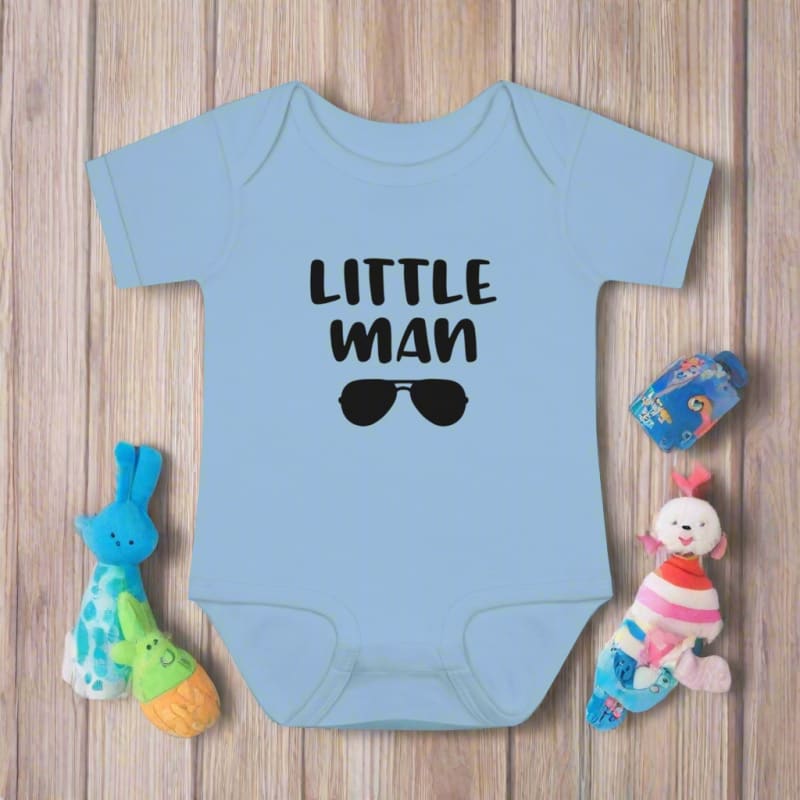 Light blue baby onesie with ’LITTLE MAN’ and sunglasses graphic printed on the front.