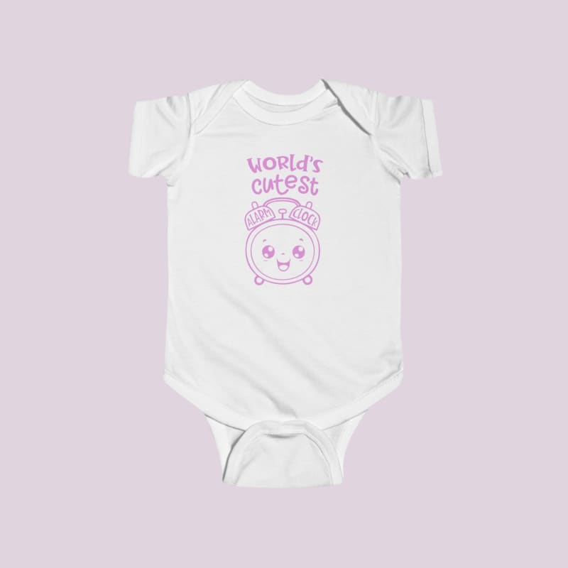 White baby onesie with pink text and a cute cartoon face design.