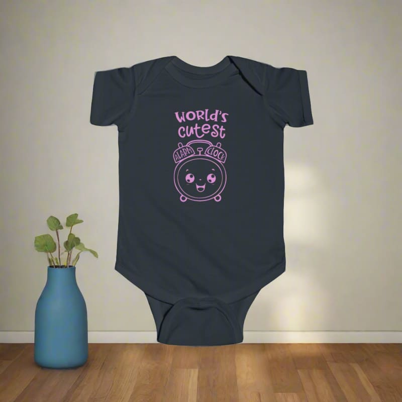 Dark gray baby onesie with pink text and a cute alarm clock design on the front.